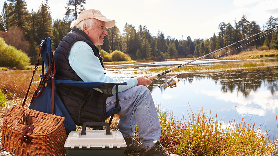 senior man fishing in a lake big bear california 2023 11 27 05 03 53 utc